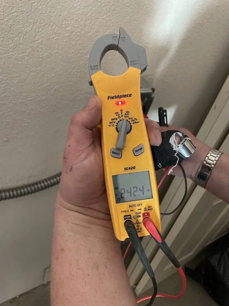 Voltage testing with clamp meter during Hot Tub / Pool Electrical Wiring in East Longmeadow